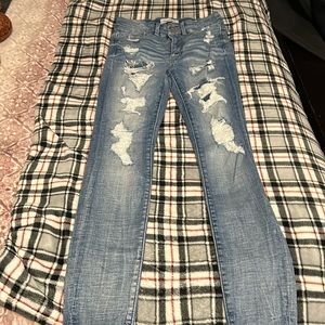 Size 25 jeans holes covered